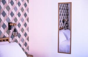 Posteľ alebo postele v izbe v ubytovaní Walk Rooms