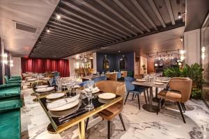 Restoran või mõni muu söögikoht majutusasutuses Concept Nisantasi Hotels & Spa