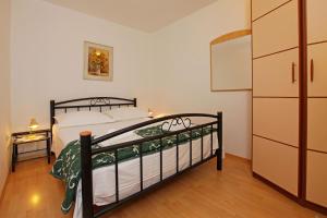 Posteľ alebo postele v izbe v ubytovaní Apartments Mel