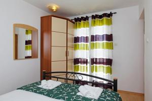 Posteľ alebo postele v izbe v ubytovaní Apartments Mel