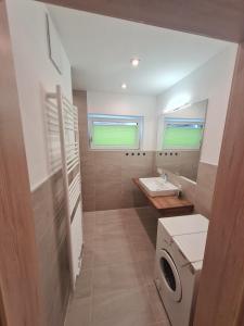 Koupelna v ubytování FrIda Appartements
