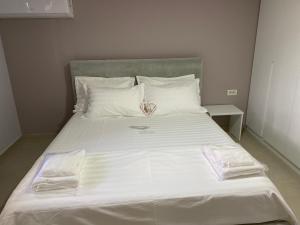 Postel nebo postele na pokoji v ubytování Green Villa