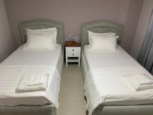 Postel nebo postele na pokoji v ubytování Green Villa