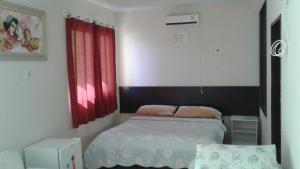 Cama o camas de una habitación en Pousada Costa Coral