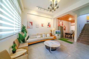 Area soggiorno di Field Trail Homestay