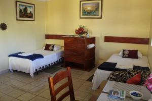 Voodi või voodid majutusasutuse Hostal Romy toas