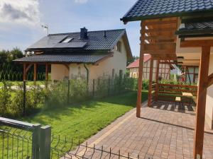 Zahrada ubytování OSADA CZTERY PORY ROKU - DOM WIOSNA