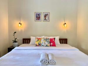 Flower Valley Plantation Homestay客房内的一张或多张床位