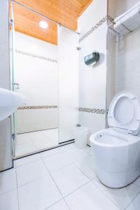 Koupelna v ubytování Yi Le Homestay + 17 fotografií