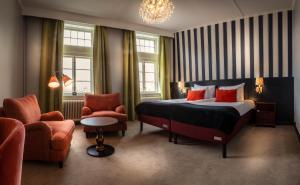 Postel nebo postele na pokoji v ubytování ProfilHotels Calmar Stadshotell + 37 fotografií
