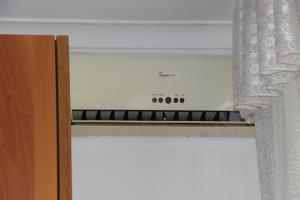 A kitchen or kitchenette at Dimora Re di Roma - Rome Apartment