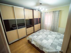 Ένα ή περισσότερα κρεβάτια σε δωμάτιο στο L&R Modern Apartment