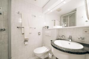 Ванна кімната в Hotel Krone Thun
