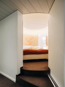 Ліжко або ліжка в номері Hotel Krone Thun