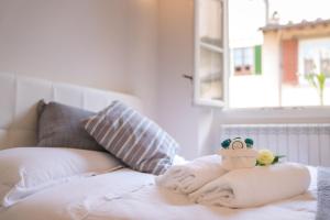 Posteľ alebo postele v izbe v ubytovaní Apartments Florence - Casa Amici