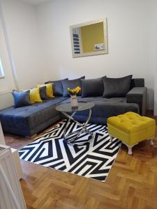 Posezení v ubytování APARTMAN SUNFLOWER