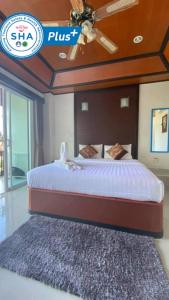 Postel nebo postele na pokoji v ubytování Vivi Boutique Room Hotel SHA Plus