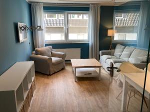 Istumisnurk majutusasutuses Klein & Fein, Appartement- und Zimmervermietung