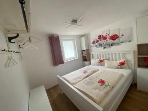 Posteľ alebo postele v izbe v ubytovaní Auszeit Salzkammergut Appartements