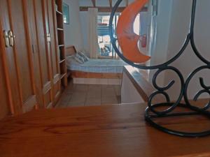 A bed or beds in a room at Casa rural As Túnel