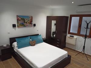 Postel nebo postele na pokoji v ubytování Casa Leon