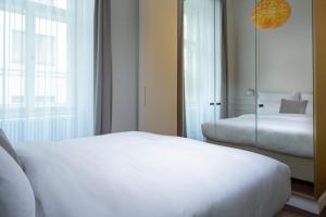 Postel nebo postele na pokoji v ubytování OREA Place Seno