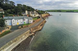 an aerial view of a town next to a body of water at Brook Cottage - 2 Bedroom Cottage - Dale in Dale