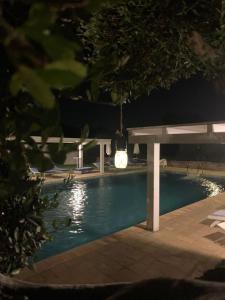 The swimming pool at or close to Casetta Letizia