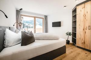 Voodi või voodid majutusasutuse Cabin8 Alpine Flair Apartments toas