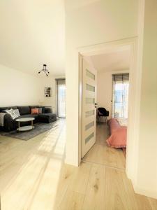 Łóżko lub łóżka w pokoju w obiekcie Apartament Premium