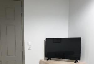 Televízia a/alebo spoločenská miestnosť v ubytovaní Garden Lefkanti, 4season Plaza Room