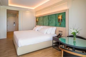 Posteľ alebo postele v izbe v ubytovaní Barceló La Nucía Palms