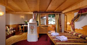 Postel nebo postele na pokoji v ubytování Hotel La Perla