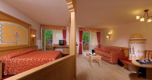 Postel nebo postele na pokoji v ubytování Hotel La Perla