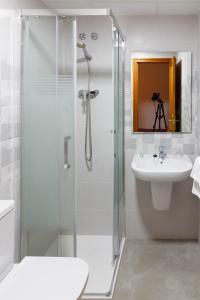 Koupelna v ubytování Hotel Herasu