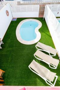 Zdjęcie z galerii obiektu Galera Beach Boutique Art Villas with Private Pools, Free Wifi & BBQ, Corralejo by Amazzzing Travel w Corralejo