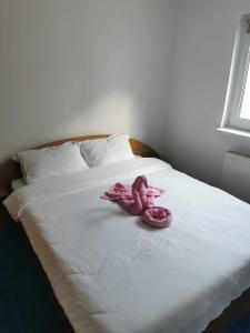 Un ou plusieurs lits dans un hébergement de l'établissement Apartament langa castan
