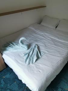 Un ou plusieurs lits dans un hébergement de l'établissement Apartament langa castan