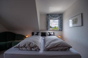 Cama o camas de una habitación en Hotel Schatulle