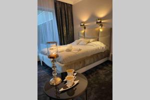 Ein Bett oder Betten in einem Zimmer der Unterkunft ApartPark Lividus room 312