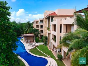 Πισίνα στο ή κοντά στο Yamanik Puerto Aventuras Condo