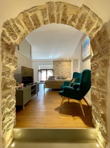 Svetainės erdvė apgyvendinimo įstaigoje Assisi AD Apartments - Fratello Sole Luxury Loft