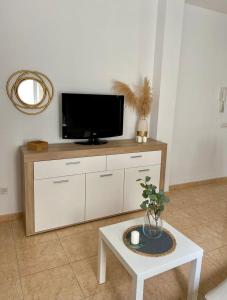 TV a/nebo společenská místnost v ubytování Namar apartamento