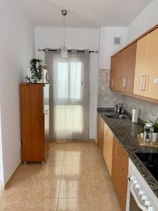 Kuchyň nebo kuchyňský kout v ubytování Namar apartamento