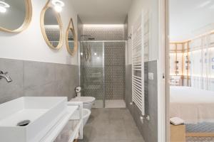 Koupelna v ubytování Terra del Sasso Suites - Design Architetto Salvatore Spataro + 20 fotografií