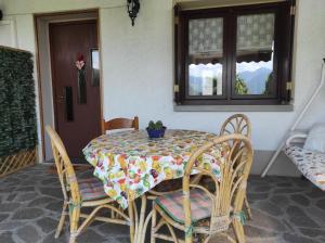 Balkón nebo terasa v ubytování CasaDolcelago Sulzano Villa con Giardino Vista Lago Parking Free