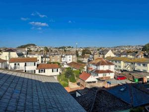 Nespecifikovaný výhled na destinaci Paignton nebo výhled na město při pohledu z prázdninového domu