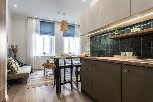 Kuchyňa alebo kuchynka v ubytovaní Sweet Dream Apartman