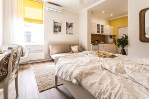 Gulta vai gultas numurā naktsmītnē Sweet Dream Apartman