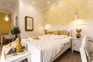 Posteľ alebo postele v izbe v ubytovaní Sweet Dream Apartman